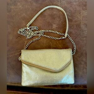 Hobo international leather fold over gold clutch. Used, very good condition.